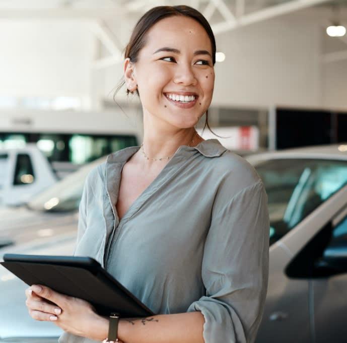 Car dealership worker on a parking lot